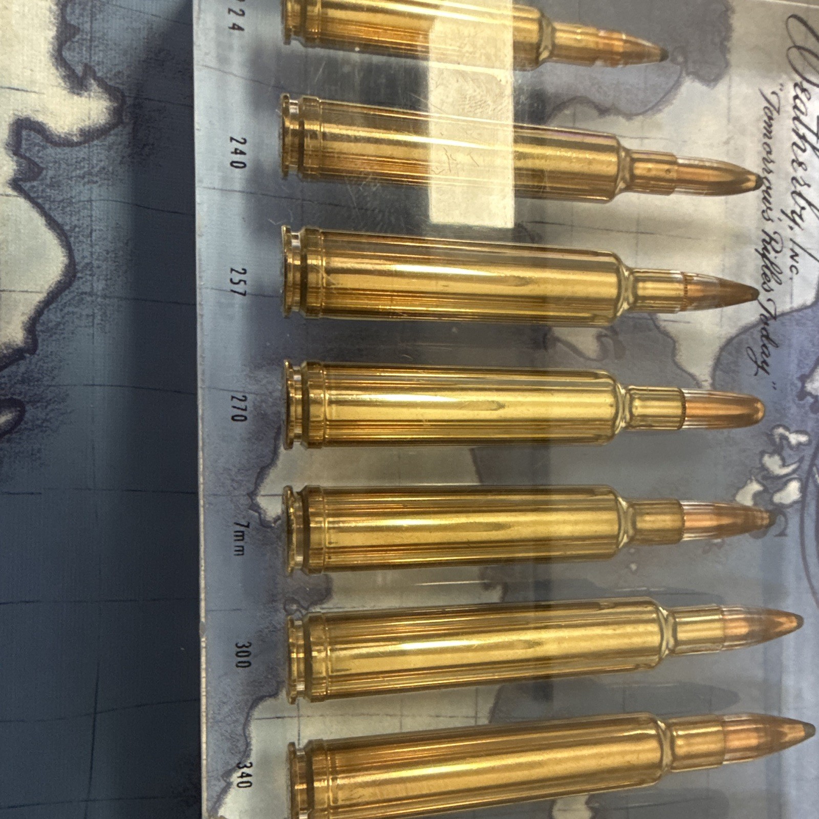 Weatherby Lucite Paperweight Clear/Gold Rifle Cartridges Display Block