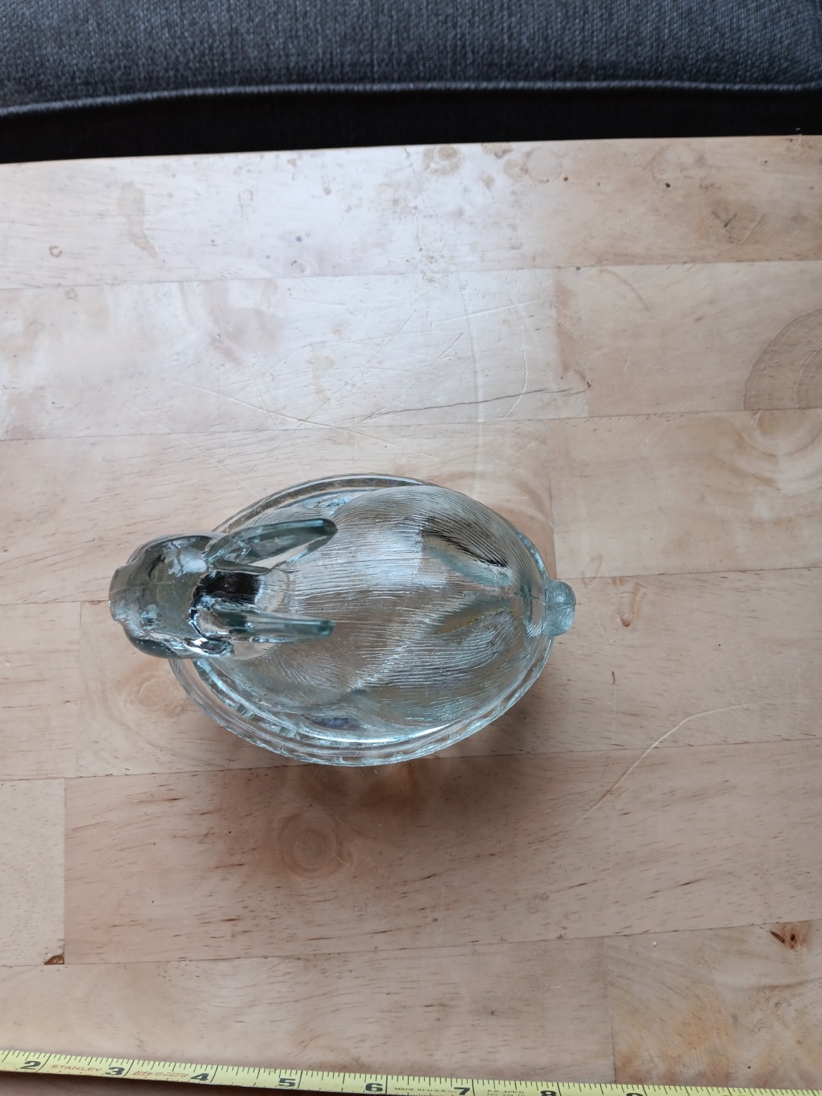 SMALL GLASS BUNNY ON A NEST. 1179