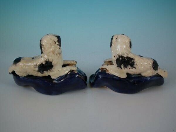 Pair Staffordshire spaniels with hare inkwells