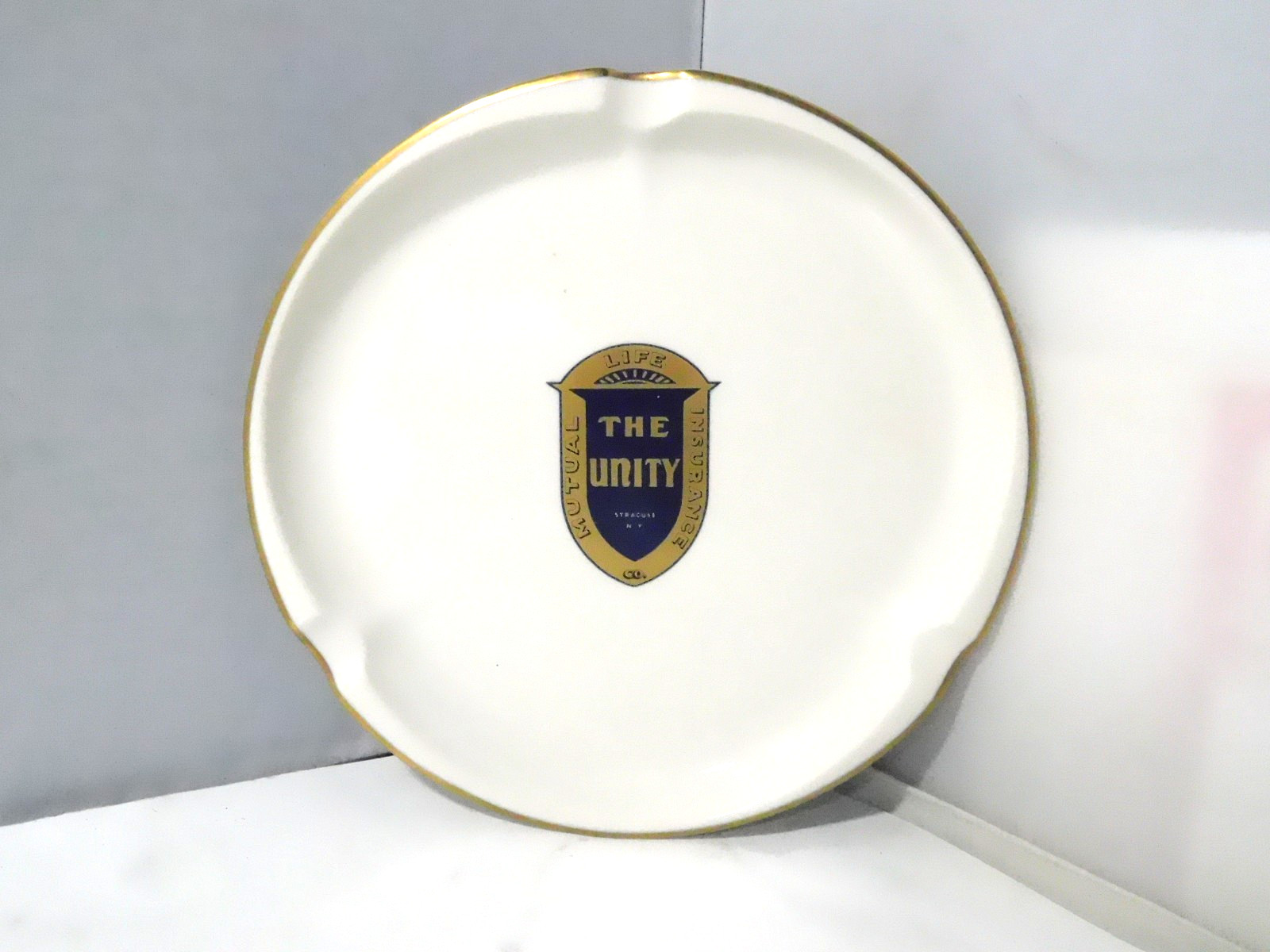 Syracuse China Ceramic Ashtray-Unity Mutual Insurance Co Logo 7 1/2″