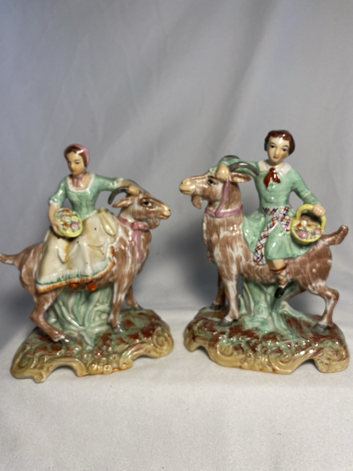 Staffordshire Boy & Girl Each Riding a Goat, 19th Century? Excellent