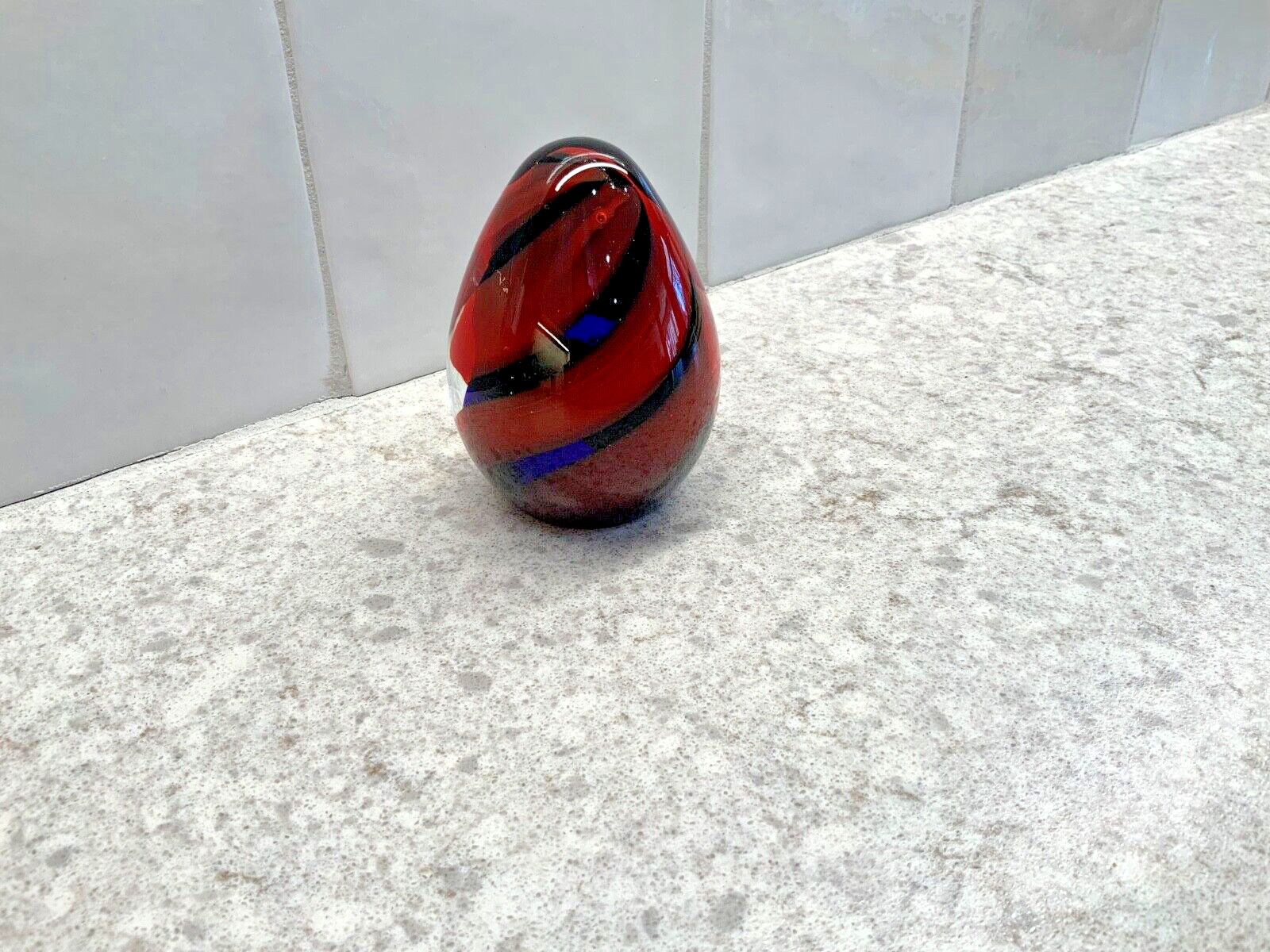 Medina Egg Shaped Paperweight Red With Black And Blue Spirals