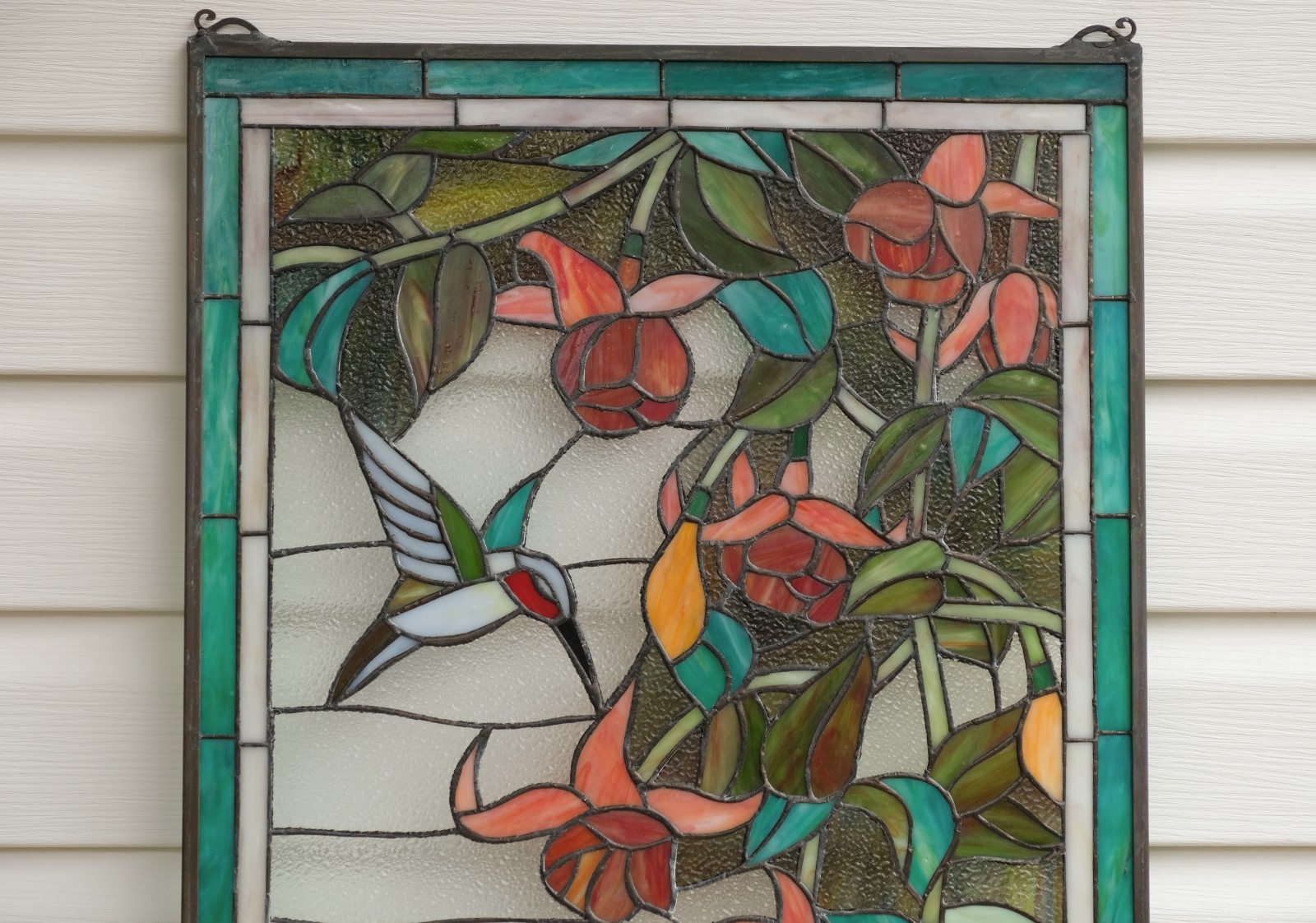 20.5″ x 34.75″ Handcrafted hummingbirds flower stained glass window panel.