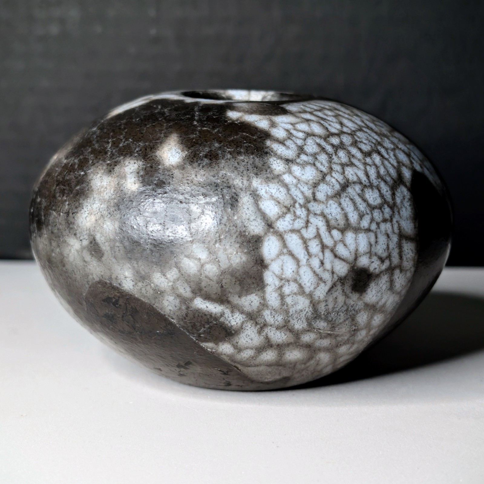 Small Naked Raku Orb “Naked Roku” Bone-White Fine-Lined Black Carbon Crackle