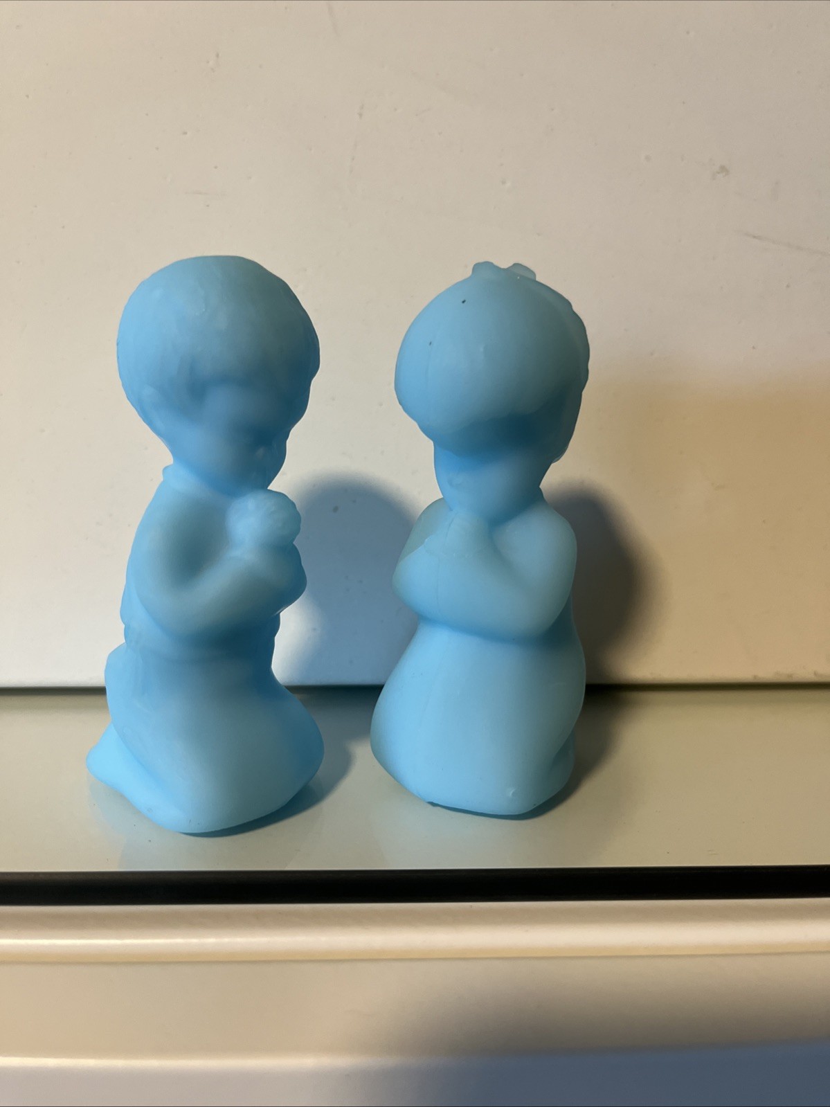 Set of 2 Fenton Blue Satin Custard Glass Praying Boy and Girl. Damaged