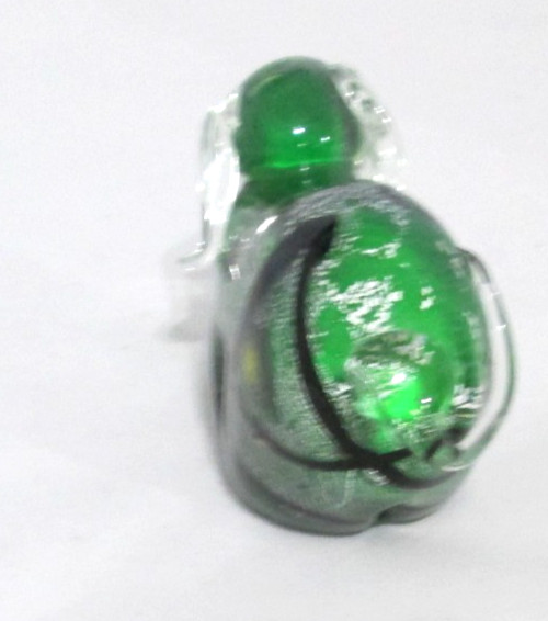 Art Glass Dog Figurine, Green, Black, Silver Flecks, Unbranded. 4″ H. 6″ W.